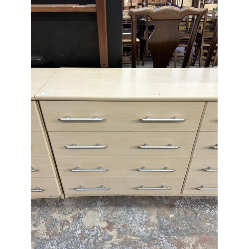 55 - A modern beech effect chest of drawers - approx. 75cm high x 112cm wide x 40cm deep