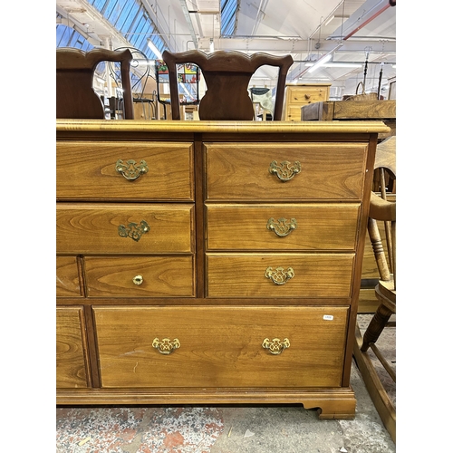 58 - A Younger cherry wood chest of drawers