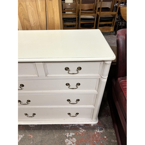 64 - A Laura Ashley Clifton ivory painted chest of drawers - approx. 87cm high x 90cm wide x 48cm deep