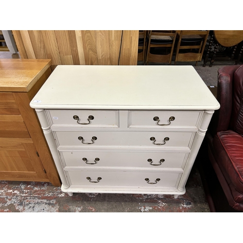 64 - A Laura Ashley Clifton ivory painted chest of drawers - approx. 87cm high x 90cm wide x 48cm deep