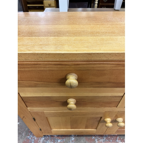 65 - A modern oak sideboard - approx. 90cm high x 120cm wide x 37cm deep