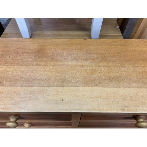 65 - A modern oak sideboard - approx. 90cm high x 120cm wide x 37cm deep