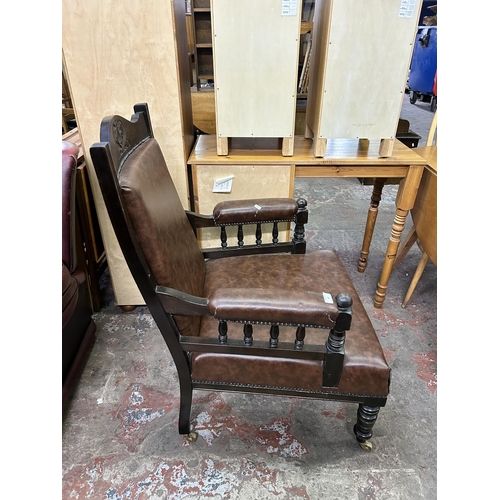 68 - An Edwardian carved beech and brown vinyl parlour chair