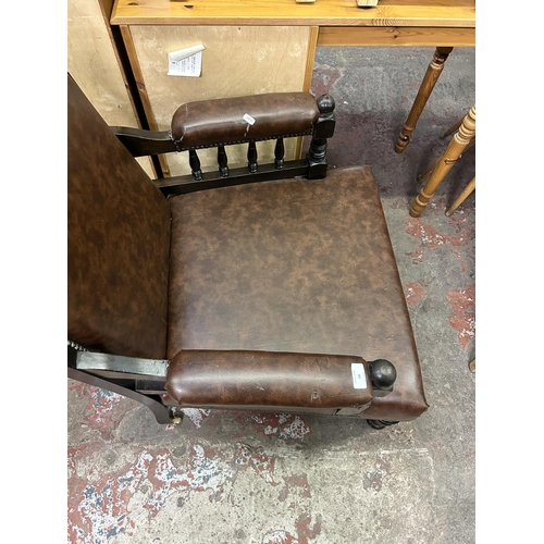 68 - An Edwardian carved beech and brown vinyl parlour chair