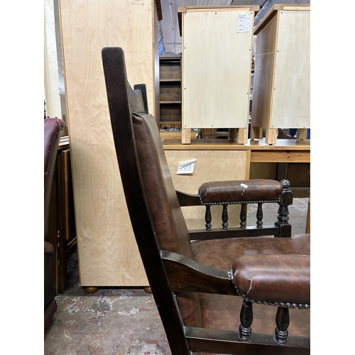 68 - An Edwardian carved beech and brown vinyl parlour chair