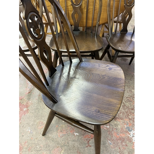 71 - Four Ercol Fleur De Lys elm and beech dining chairs