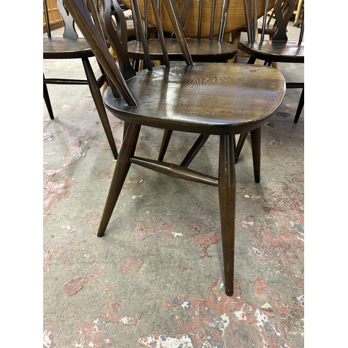 71 - Four Ercol Fleur De Lys elm and beech dining chairs