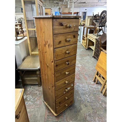 74 - A pine chest of drawers - approx. 140cm high x 43cm wide x 39cm deep