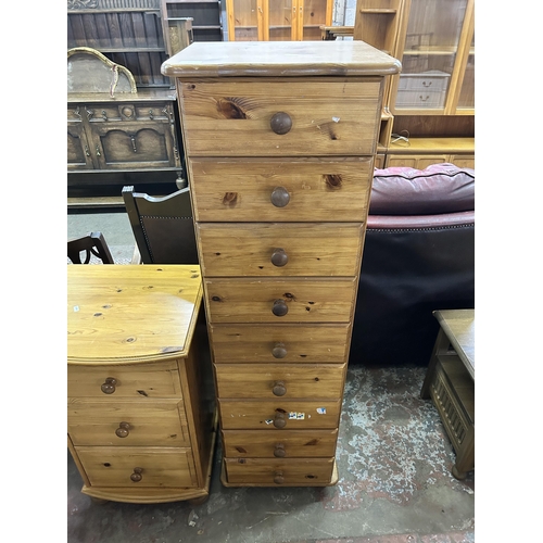 74 - A pine chest of drawers - approx. 140cm high x 43cm wide x 39cm deep