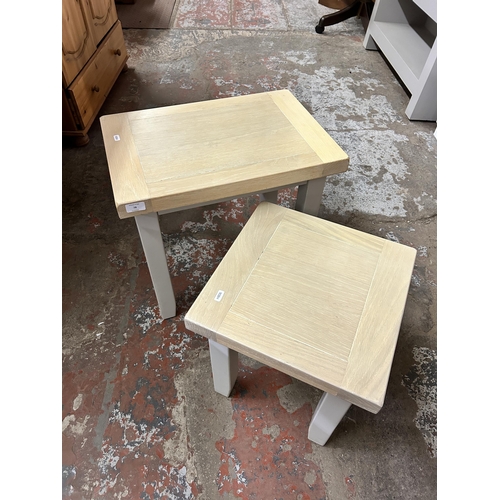 78 - Two modern limed oak and grey painted side tables - largest approx. 50cm high x 37cm wide x 54cm lon... 