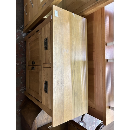 79 - A modern oak sideboard - approx. 80cm high x 80cm wide x 34cm deep