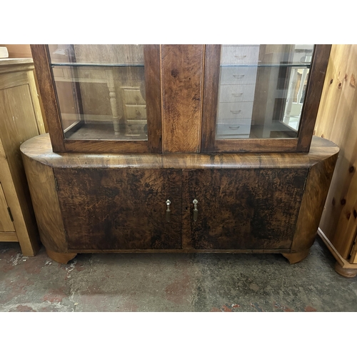 80 - An Art Deco walnut display cabinet - approx. 158cm high x 126cm wide x 38cm deep