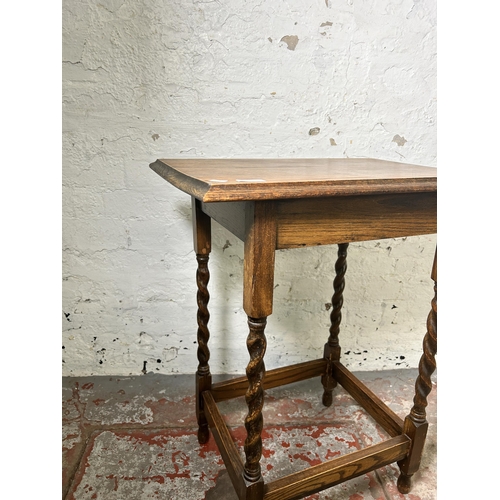 9 - An early 20th century oak rectangular side table on barley twist supports - approx. 73cm high x 40cm... 