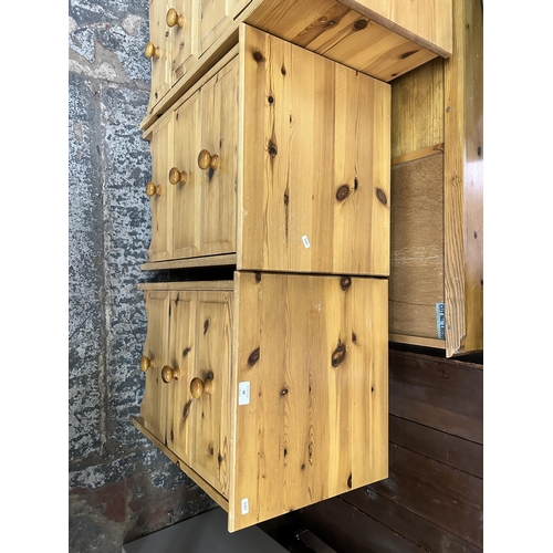 92 - A pair of pine bedside chests of drawers - approx. 62cm high x 44.5cm wide x 39cm deep