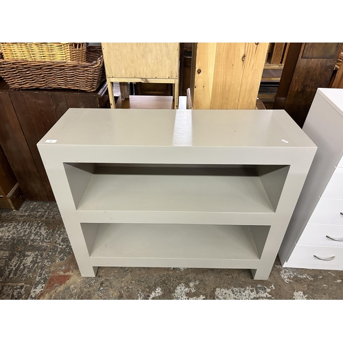 94 - A Next grey painted oak two tier bookcase - approx. 83cm high x 100cm wide x 35cm deep