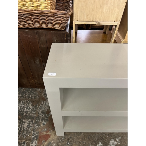 94 - A Next grey painted oak two tier bookcase - approx. 83cm high x 100cm wide x 35cm deep