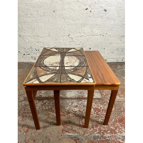 96 - A 1970s Trioh of Denmark teak and tile top nest of tables - largest approx. 46cm high x 62cm wide x ... 