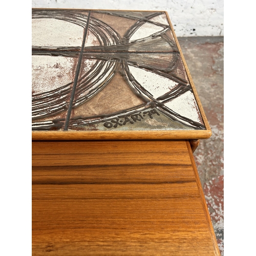 96 - A 1970s Trioh of Denmark teak and tile top nest of tables - largest approx. 46cm high x 62cm wide x ... 