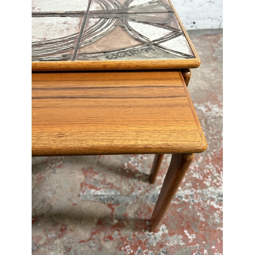 96 - A 1970s Trioh of Denmark teak and tile top nest of tables - largest approx. 46cm high x 62cm wide x ... 