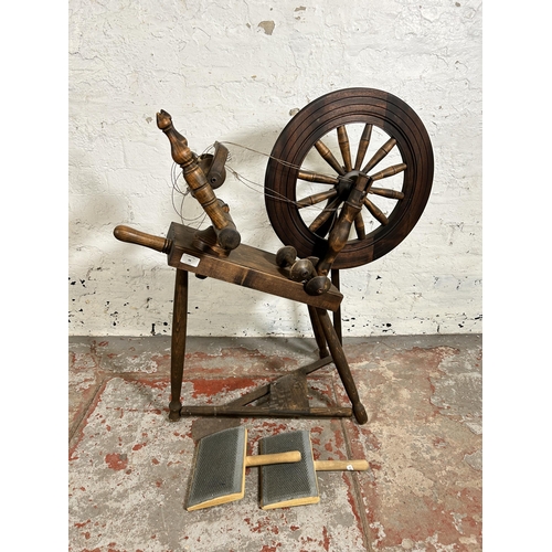 98 - A Victorian style elm and beech spinning wheel - approx. 81cm high x 76cm long