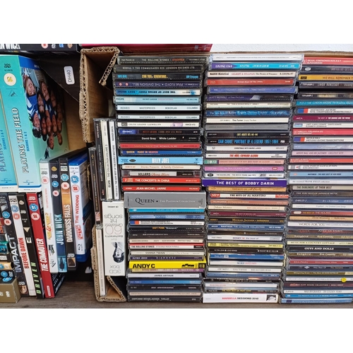 784 - A collection of mixed media; CDs to include The Rolling Stones, Pink Floyd, Bob Dylan, Daft Punk, An... 