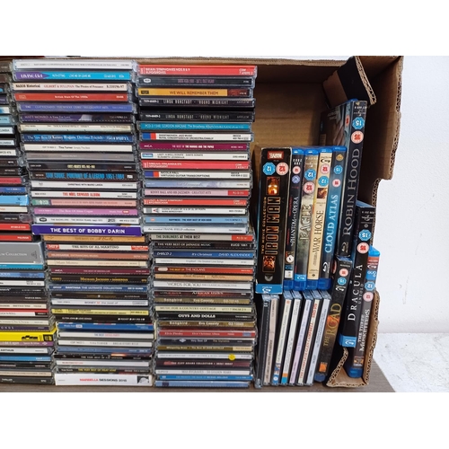 784 - A collection of mixed media; CDs to include The Rolling Stones, Pink Floyd, Bob Dylan, Daft Punk, An... 