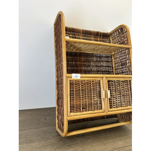 190 - A mid 20th century wicker wall hanging two tier shelving unit - approx. 57cm high x 40cm wide x 16cm... 