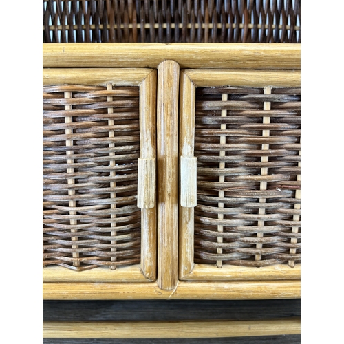 190 - A mid 20th century wicker wall hanging two tier shelving unit - approx. 57cm high x 40cm wide x 16cm... 