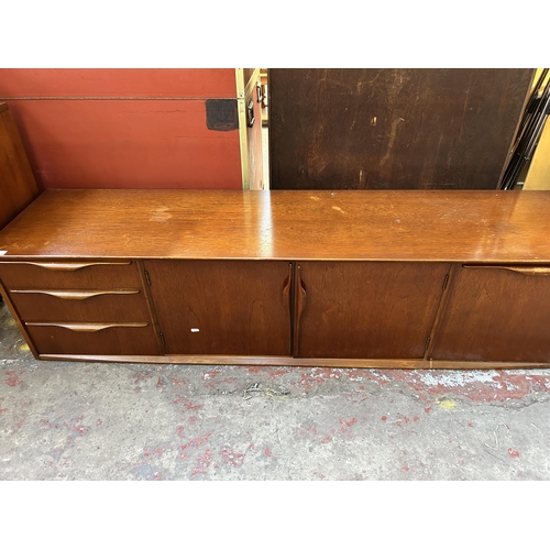 192 - A mid 20th century teak sideboard - approx. 46cm high x 183cm wide x 44cm deep