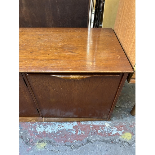 192 - A mid 20th century teak sideboard - approx. 46cm high x 183cm wide x 44cm deep