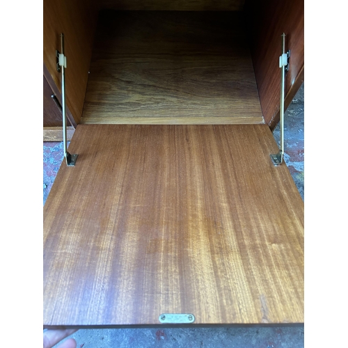 192 - A mid 20th century teak sideboard - approx. 46cm high x 183cm wide x 44cm deep