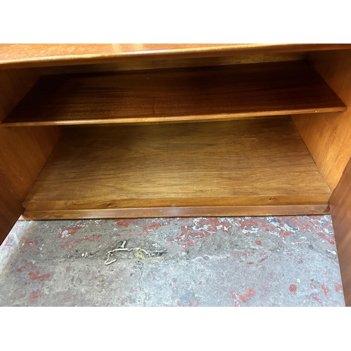 192 - A mid 20th century teak sideboard - approx. 46cm high x 183cm wide x 44cm deep