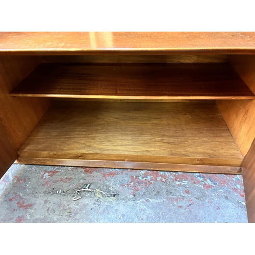 192 - A mid 20th century teak sideboard - approx. 46cm high x 183cm wide x 44cm deep