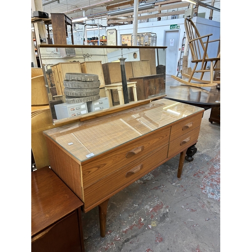 194 - A mid 20th century teak effect dressing table - approx. 120cm high x 126cm wide x 45cm deep