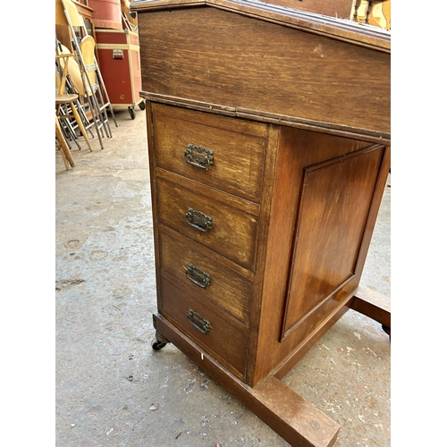 198 - A Victorian mahogany Davenport desk stamped Hobbs & Co London to brass lock - approx. 87cm high x 53... 