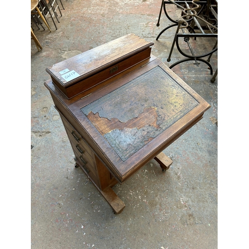 198 - A Victorian mahogany Davenport desk stamped Hobbs & Co London to brass lock - approx. 87cm high x 53... 