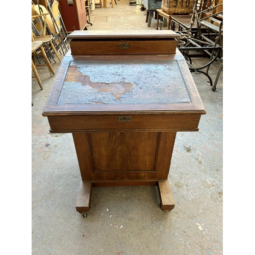 198 - A Victorian mahogany Davenport desk stamped Hobbs & Co London to brass lock - approx. 87cm high x 53... 