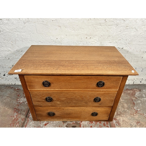 200 - An early 20th century oak chest of drawers - approx. 53cm high x 76cm wide x 45cm deep