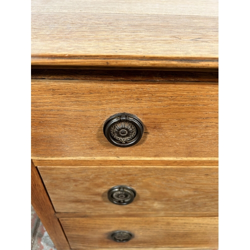 200 - An early 20th century oak chest of drawers - approx. 53cm high x 76cm wide x 45cm deep