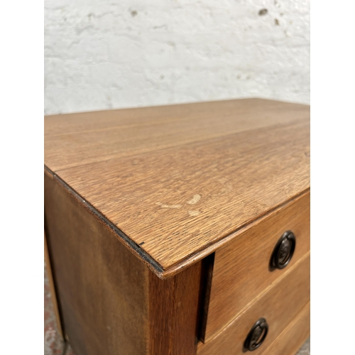 200 - An early 20th century oak chest of drawers - approx. 53cm high x 76cm wide x 45cm deep