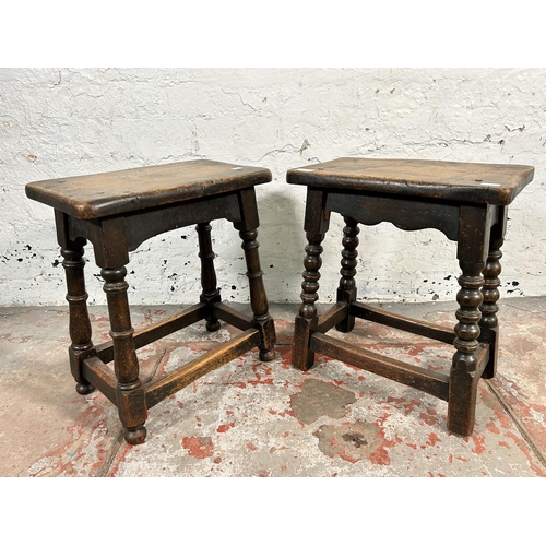 201 - Two 17th century style oak joint stools - largest approx. 45cm high x 24cm wide x 39cm long