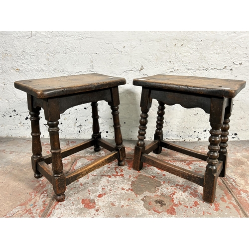 201 - Two 17th century style oak joint stools - largest approx. 45cm high x 24cm wide x 39cm long