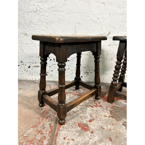 201 - Two 17th century style oak joint stools - largest approx. 45cm high x 24cm wide x 39cm long