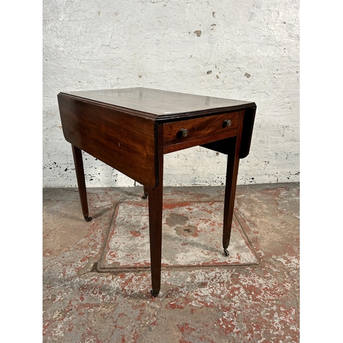 202 - A 19th century mahogany drop leaf Pembroke table