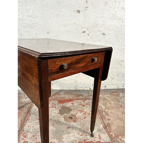 202 - A 19th century mahogany drop leaf Pembroke table