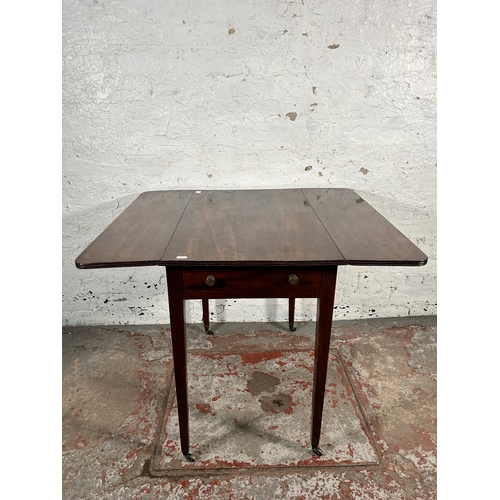 202 - A 19th century mahogany drop leaf Pembroke table