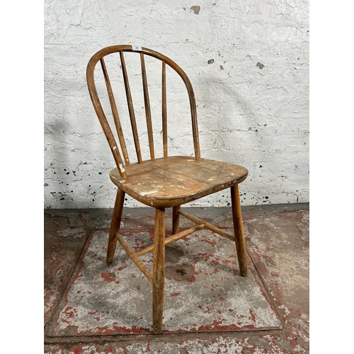 206 - Two Ercol blonde elm and beech chairs