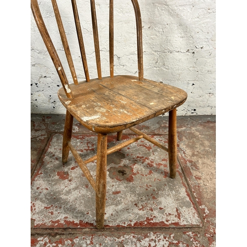 206 - Two Ercol blonde elm and beech chairs