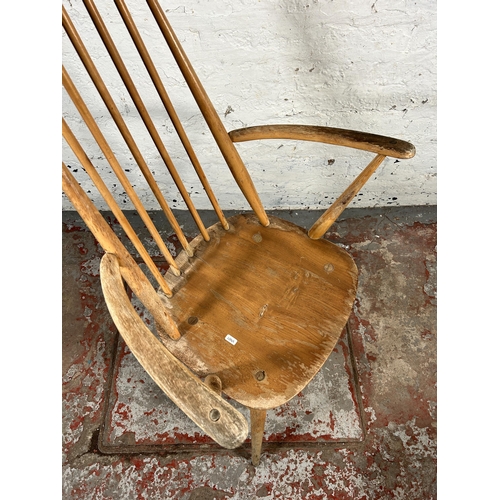 206 - Two Ercol blonde elm and beech chairs