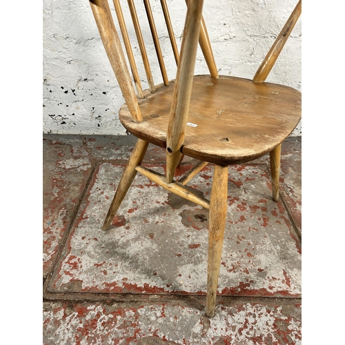 206 - Two Ercol blonde elm and beech chairs